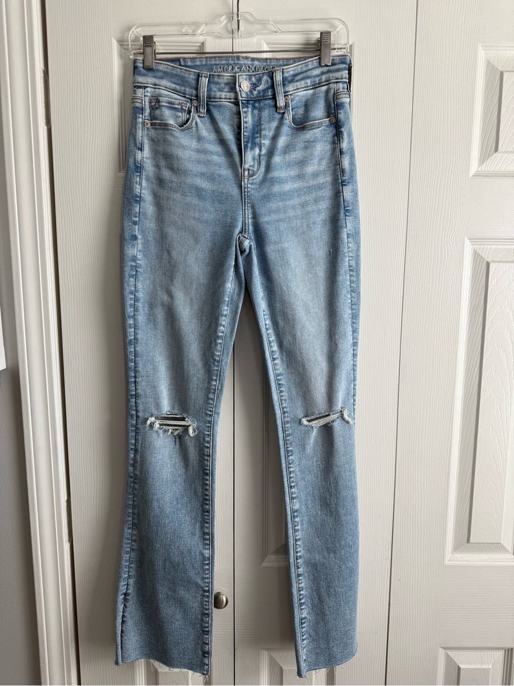 American Eagle Outfitters Light Wash Flare Jeans with Knee Rips